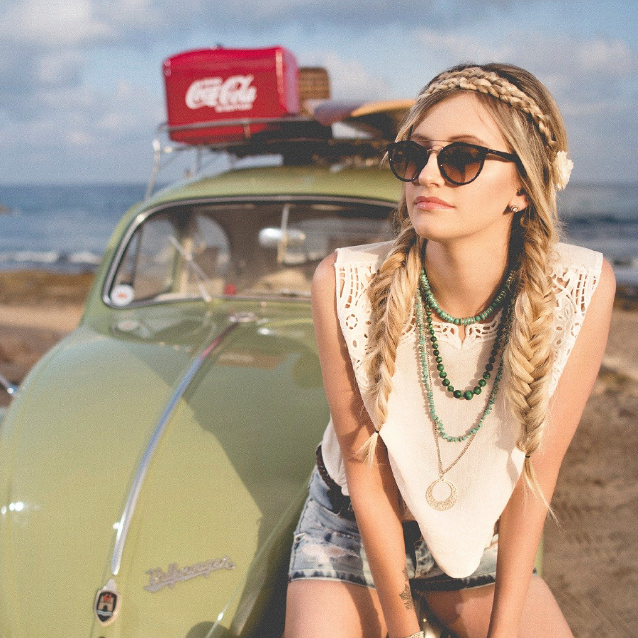 Girl on hood of a car